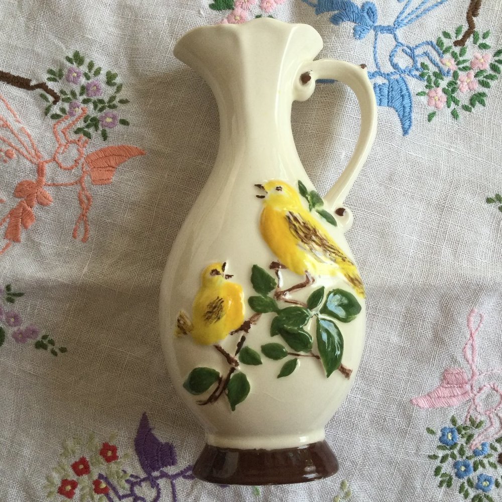 Vintage small vase with raised yellow birds on branch handled signed 15cm tall